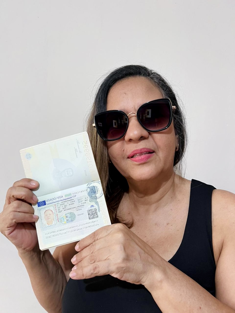 Cliente de Visas IDV con su visa aprobada
